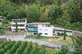 Latsch/Tarsch: Vermietete 3-Zimmerwohnung mit Garten und Keller zu verkaufen