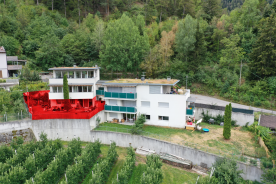 Latsch/Tarsch: Vermietete 3-Zimmerwohnung mit Keller und Garten zu verkaufen
